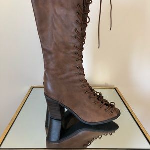 Laced up knee high boots